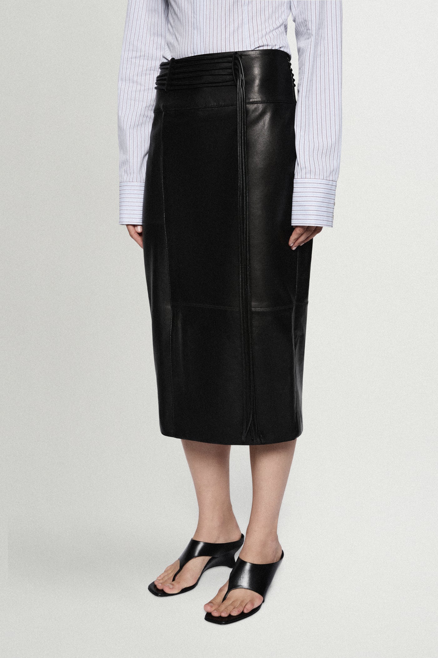 LEATHER MIDI SKIRT