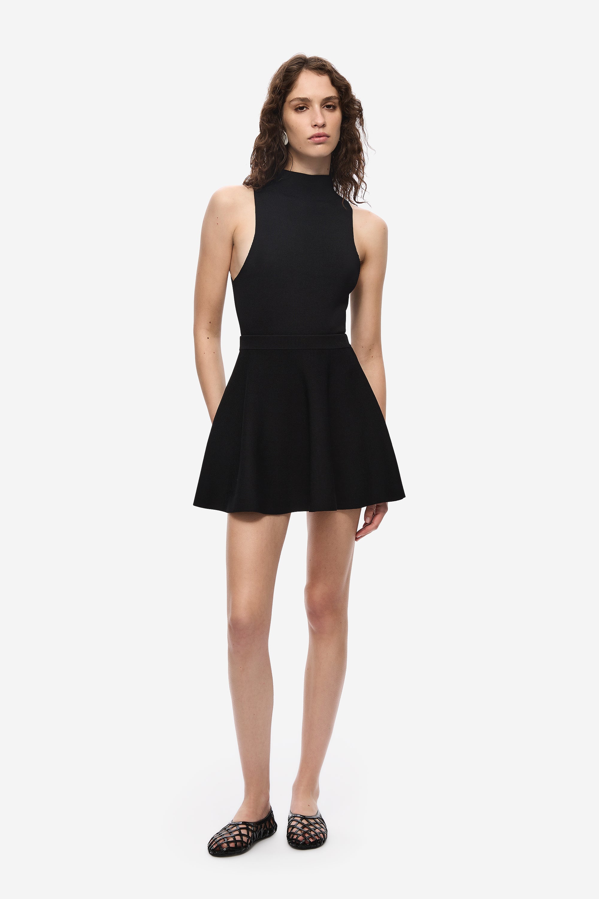 MISHA | The Flared Compact Knit Mini Skirt